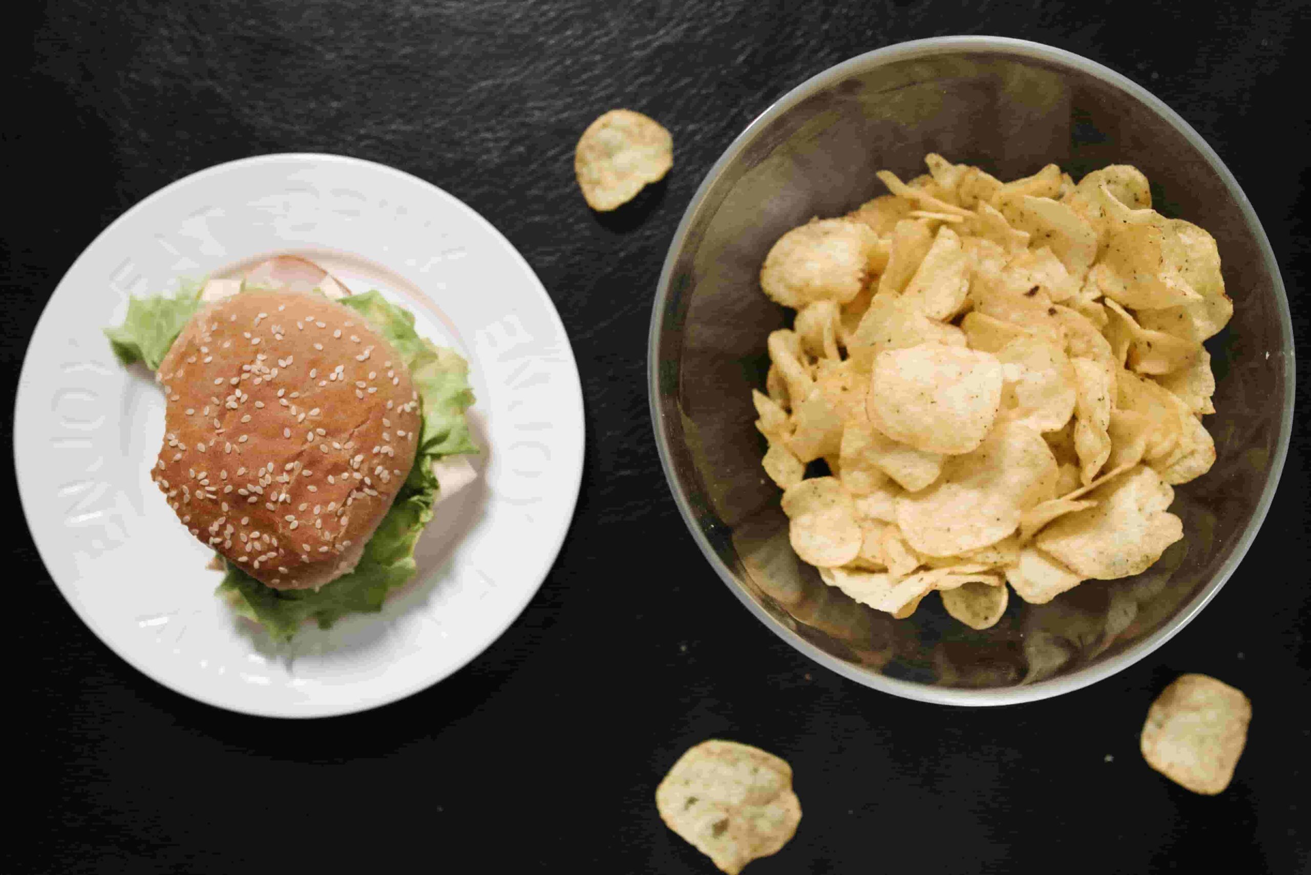 Healthy alternatives to junk food including fresh fruits, vegetables, nuts, and nutritious snacks